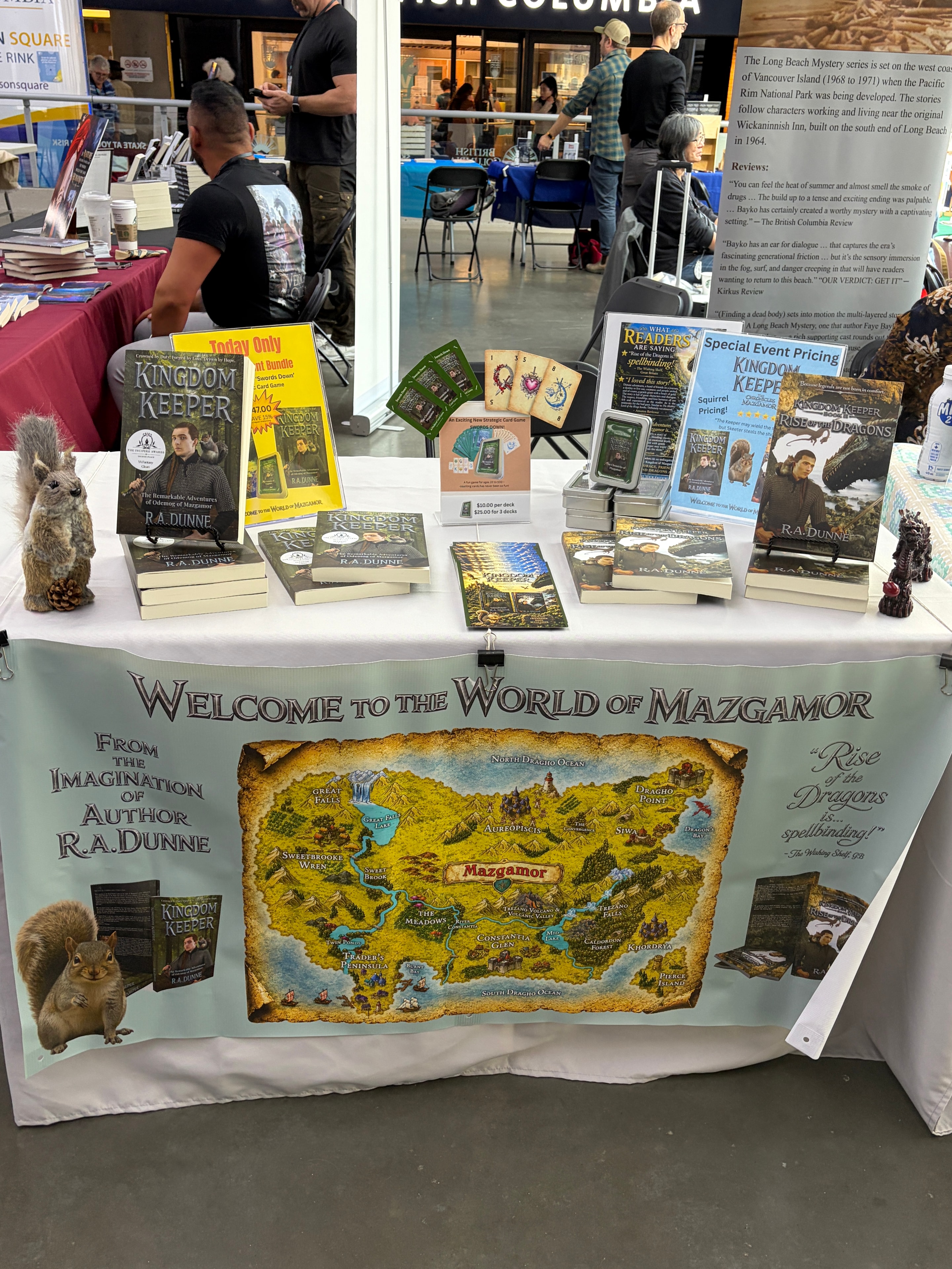 Welcome to the World of Mazgamor display banner with Kingdom Keeper books and merchandise at event