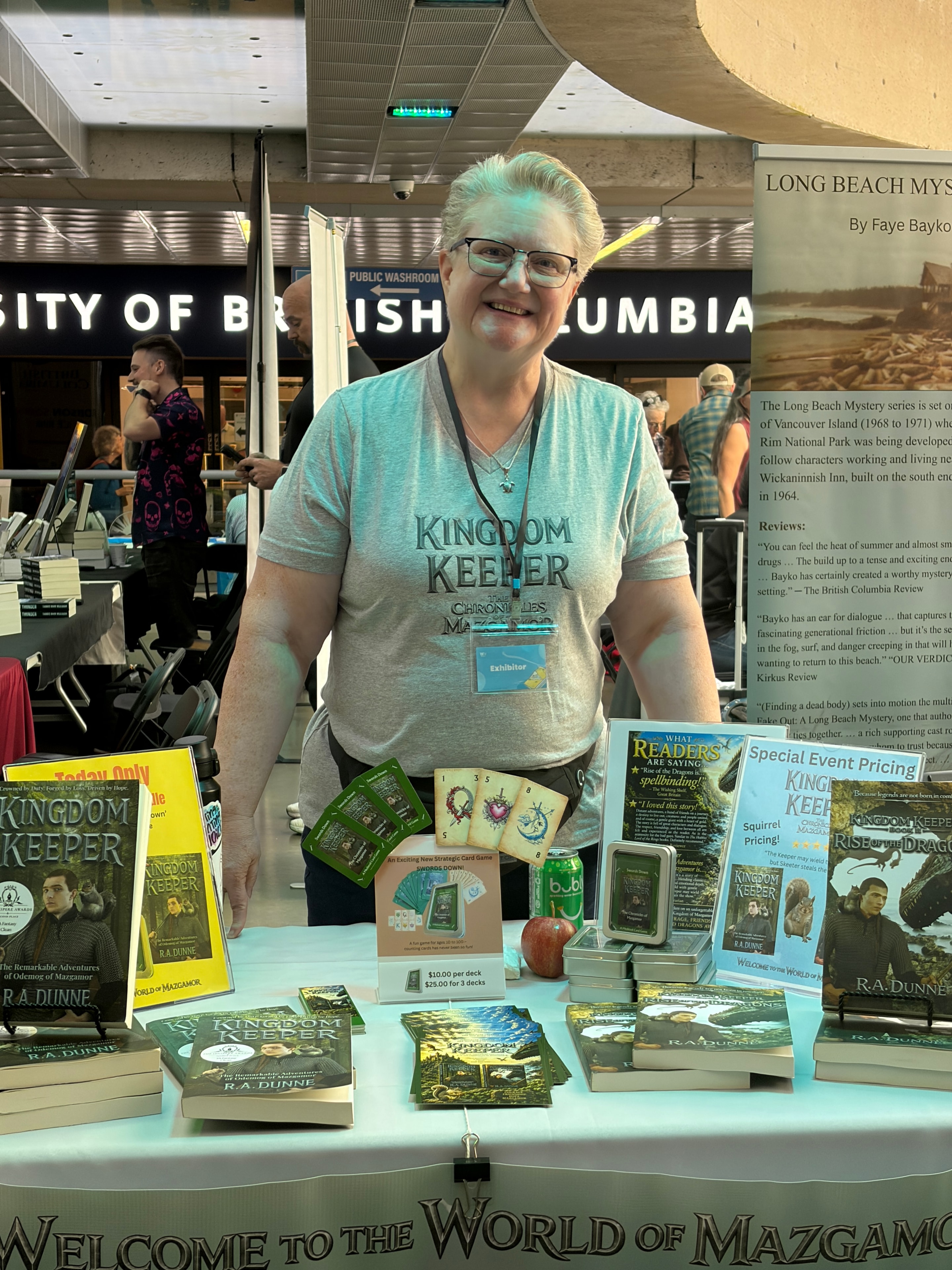 R.A. Dunne wearing Kingdom Keeper Chronicles of Mazgamor shirt at book fair event